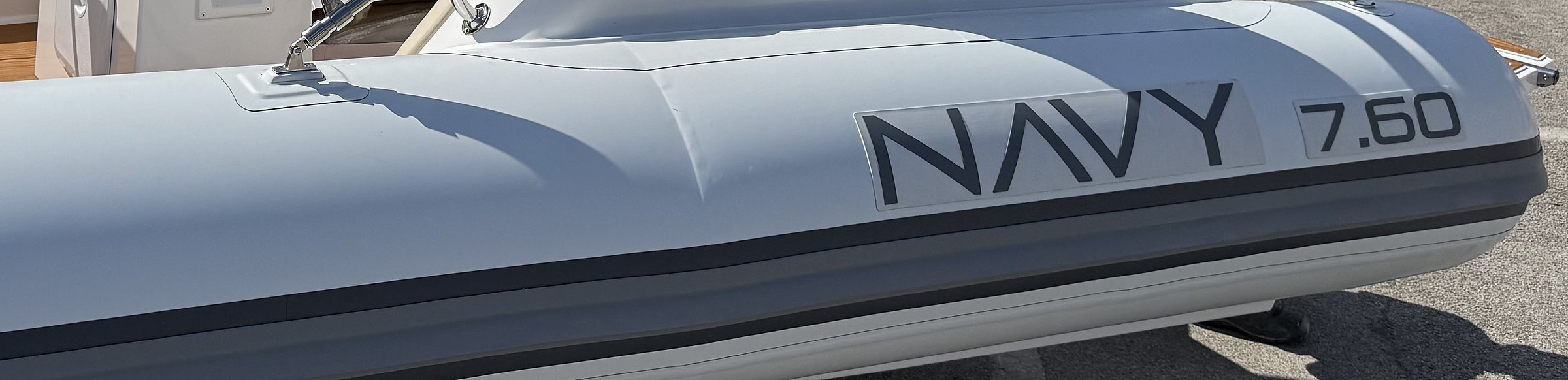 White tube of the NAVY 7.60 with grey NAVY 7.60 lettering and double rubbing strake